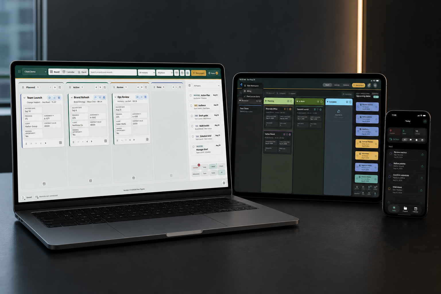 PlanConsole for Windows, iPad, and iPhone presented together in a meticulous office workspace